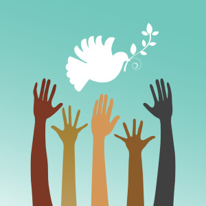 Dove of peace with multicultural hands