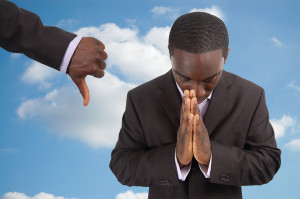 this is an image of a man being peaceful in the face of "persecution". this image can also imply "rejected prayers".